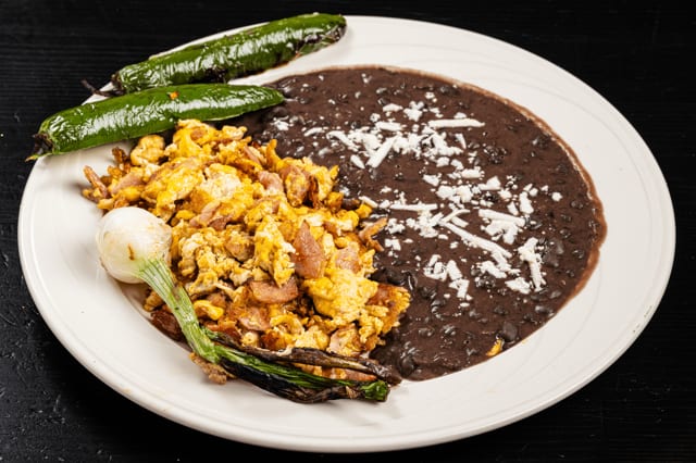 Plate Ham, Eggs, Mexican Chorizo & Beans.